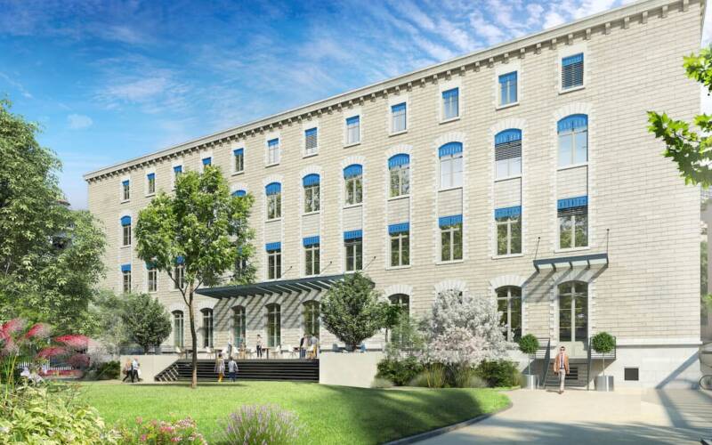 Réhabilitation d'une ancienne école en programme mixte